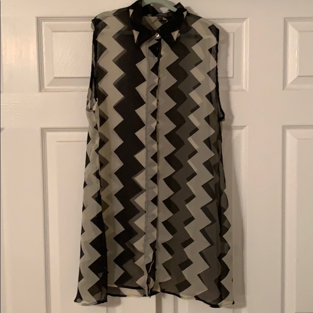 Sleeveless,  tunic blouse